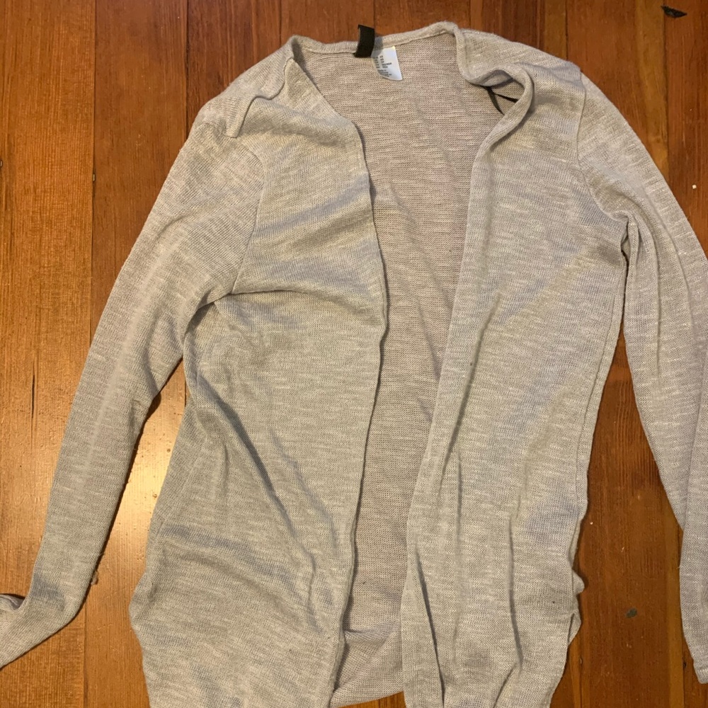 Breathable light grey cardigan.